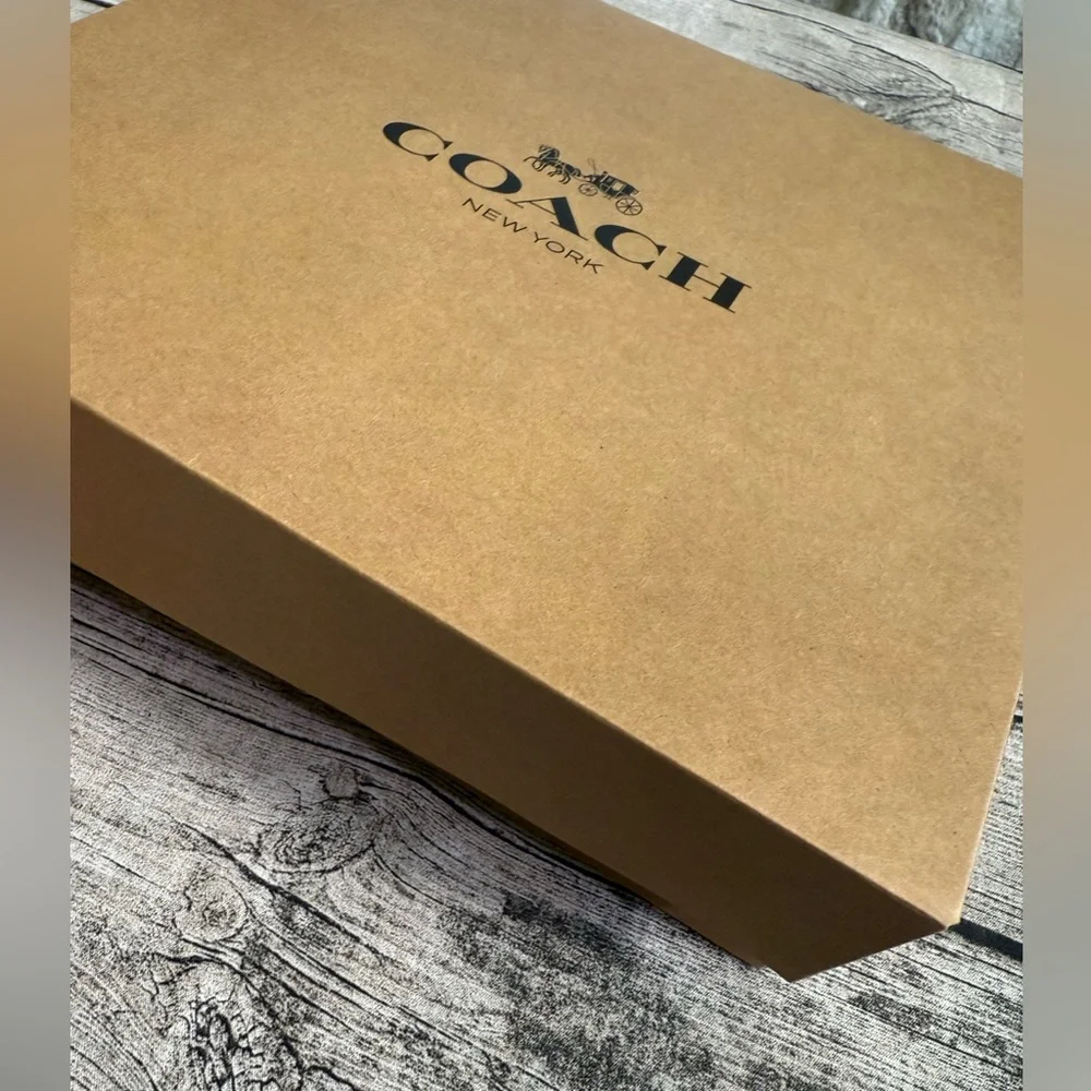 New. Coach large gift box + tissue paper. 10.5 x 12.5 x 4.5 in. Logo printed